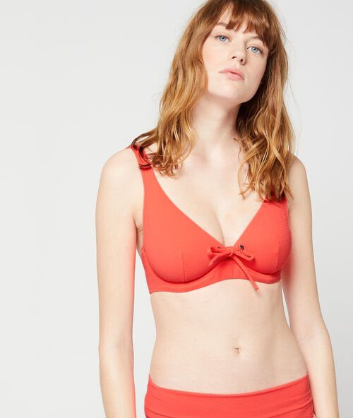 Bikinioberteil mit k&ouml;rbchen, &ouml;sen und b&auml;ndchen als details korallenrot.