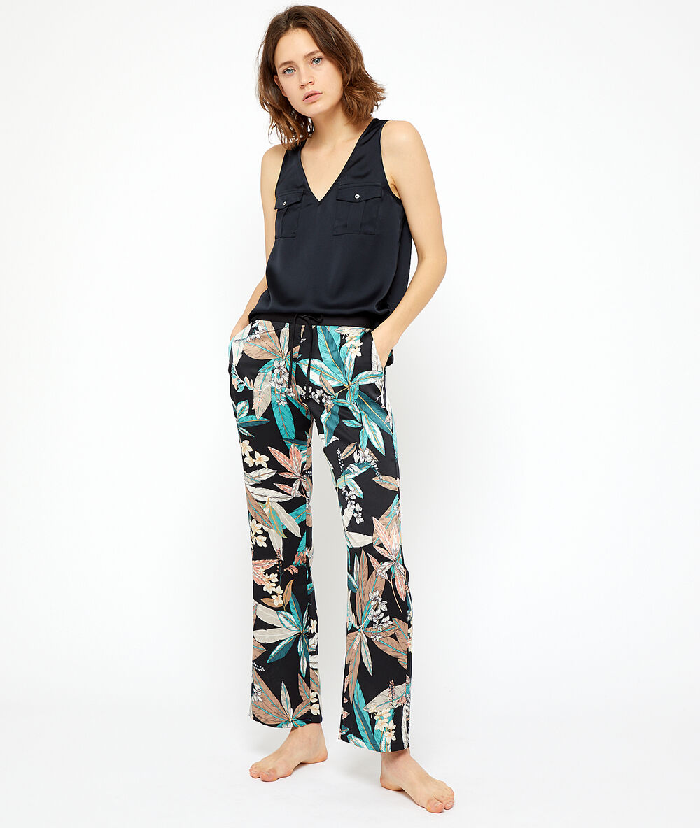 Hose mit blätter-print schwarz.