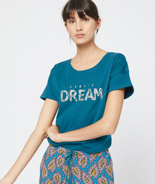 T-shirt imprimé à message bleu vert.