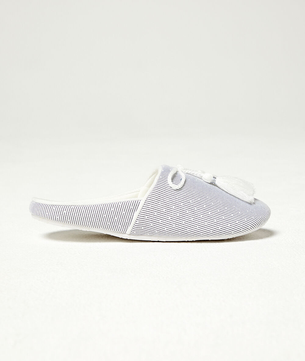 Chaussons mules turquoise.