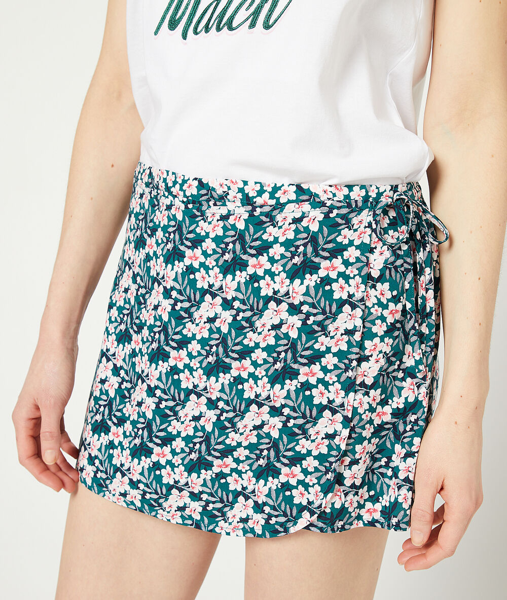 Short portefeuille imprimé fleuri vert.