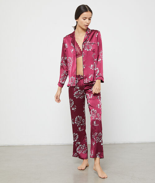 Pantalon satin imprimé fleuri bordeaux.