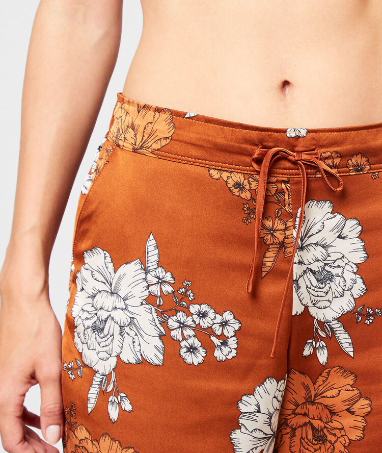 Seidig schimmernde hose mit floralem print braun.
