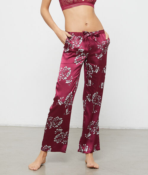 Pantalon satin imprim&eacute; fleuri bordeaux.