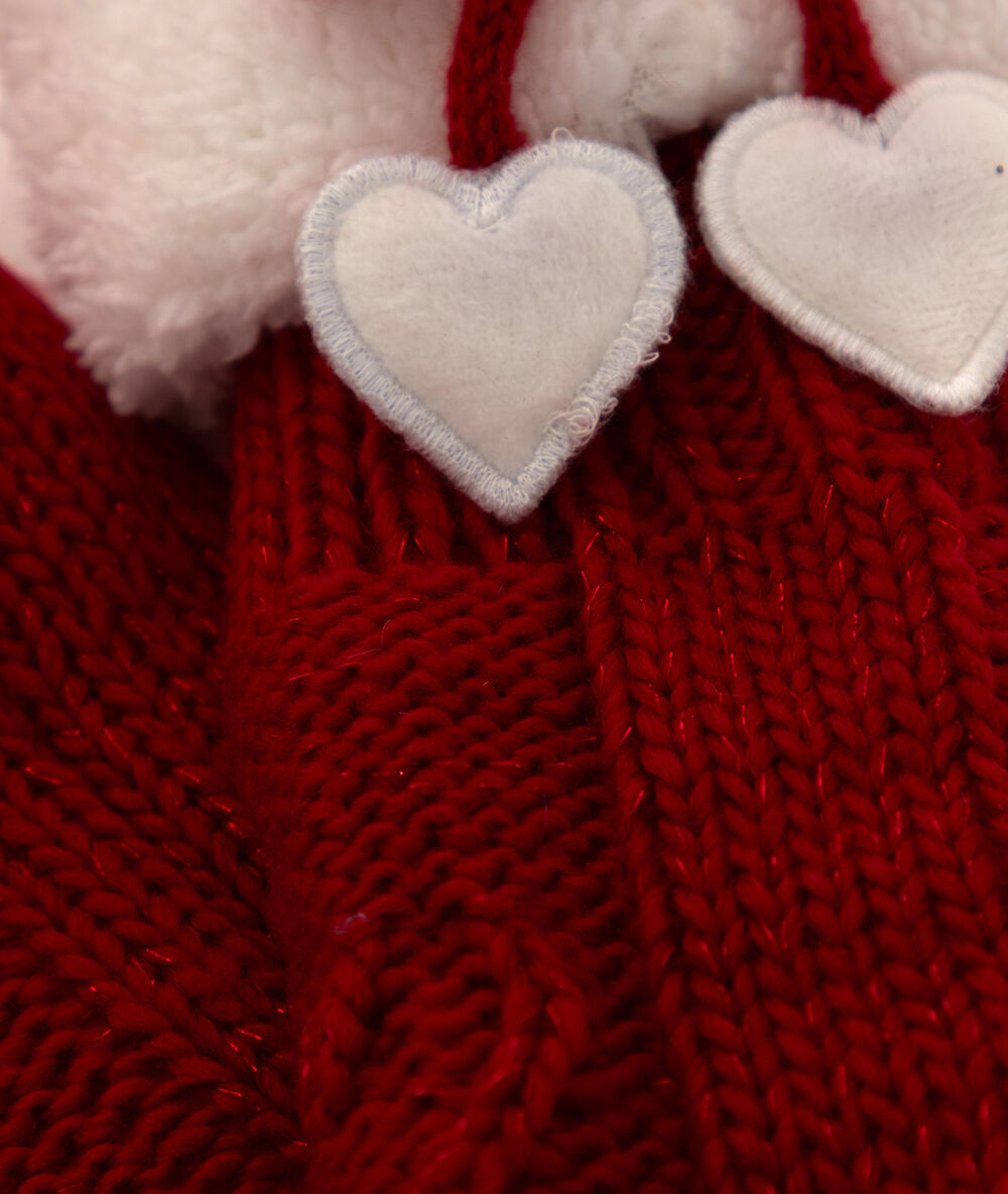 Chaussettes d'intérieur fourrées rouge.