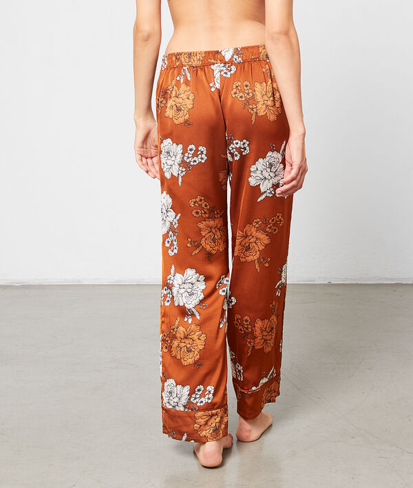 Seidig schimmernde Hose mit floralem Print Seidig schimmernde Hose mit floralem Print