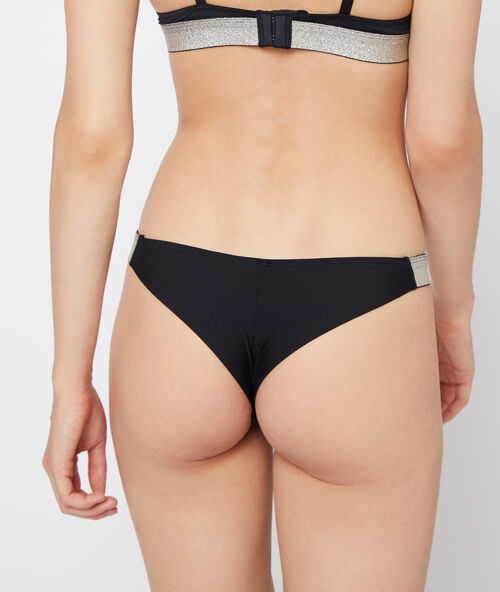 Tanga en dentelle à fibres métallisées or.